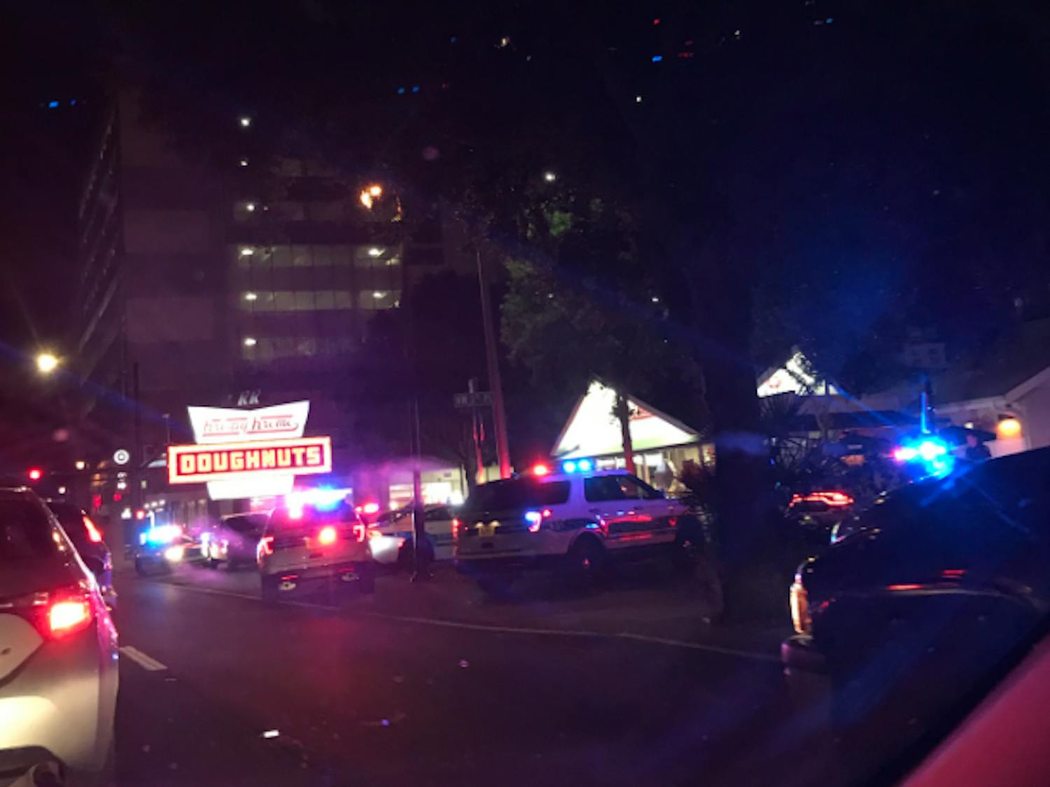 Police arrested a man accused of stabbing someone outside of Krispy Kreme Wednesday night.