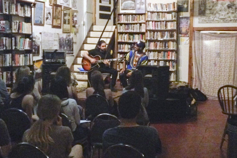 <p>Terry Wissel (left), known by his stage name name T. Wissel, performs alongside California-based artist Courtney Linsey, known by his stage name SuNWhoa Love, in the Civic Media Center on Saturday night. The pair performed for To Write Love On Her Arms’ annual benefit “Living Stories,” concert.</p>