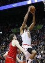 Atlanta Hawks center Al Horford (15) scores against Chicago Bulls center Pau Gasol (16) in the second half of an NBA basketball game Saturday, Jan. 9, 2016, in Atlanta. Atlanta won 120-105. (AP Photo/John Bazemore)