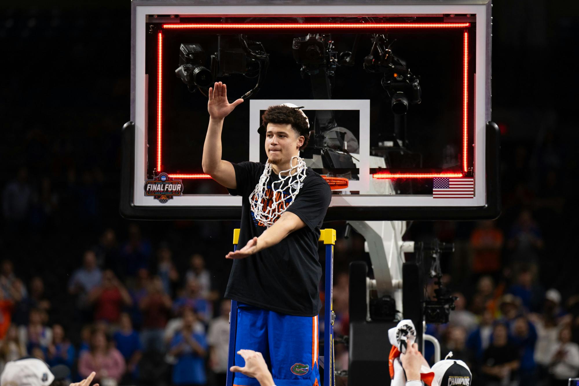 Florida Gators guard Walter Clayton Jr. (1) does the gator chomp with the net around his neck after winning the National Championship against the Houston Cougars in the NCAA Tournament on Monday, April 7, 2025, in San Antonio, Texas.