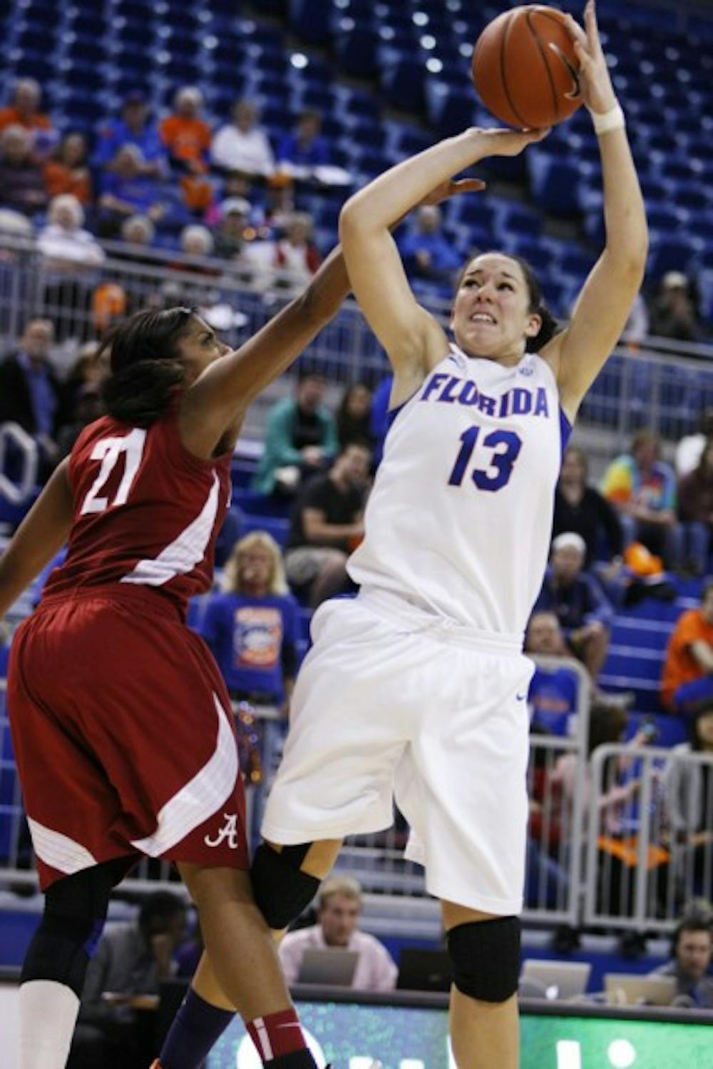 <p>Gators center Azania Stewart (13) scored eight points and grabbed 10 rebounds in Florida’s 61-37 win against Alabama on Thursday.</p>