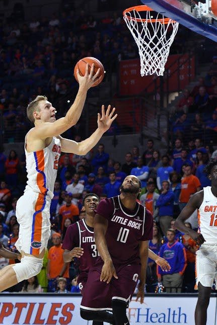 UF guard Canyon Barry attempts a layup in Florida's 94-71 win over The University of Arkansas at Little Rock on Dec. 21 at the Stephen C. O'Connell Center.&nbsp;