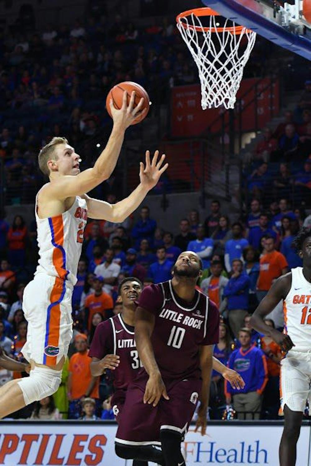 <p>UF guard Canyon Barry attempts a layup in Florida's 94-71 win over The University of Arkansas at Little Rock on Dec. 21 at the Stephen C. O'Connell Center.&nbsp;</p>