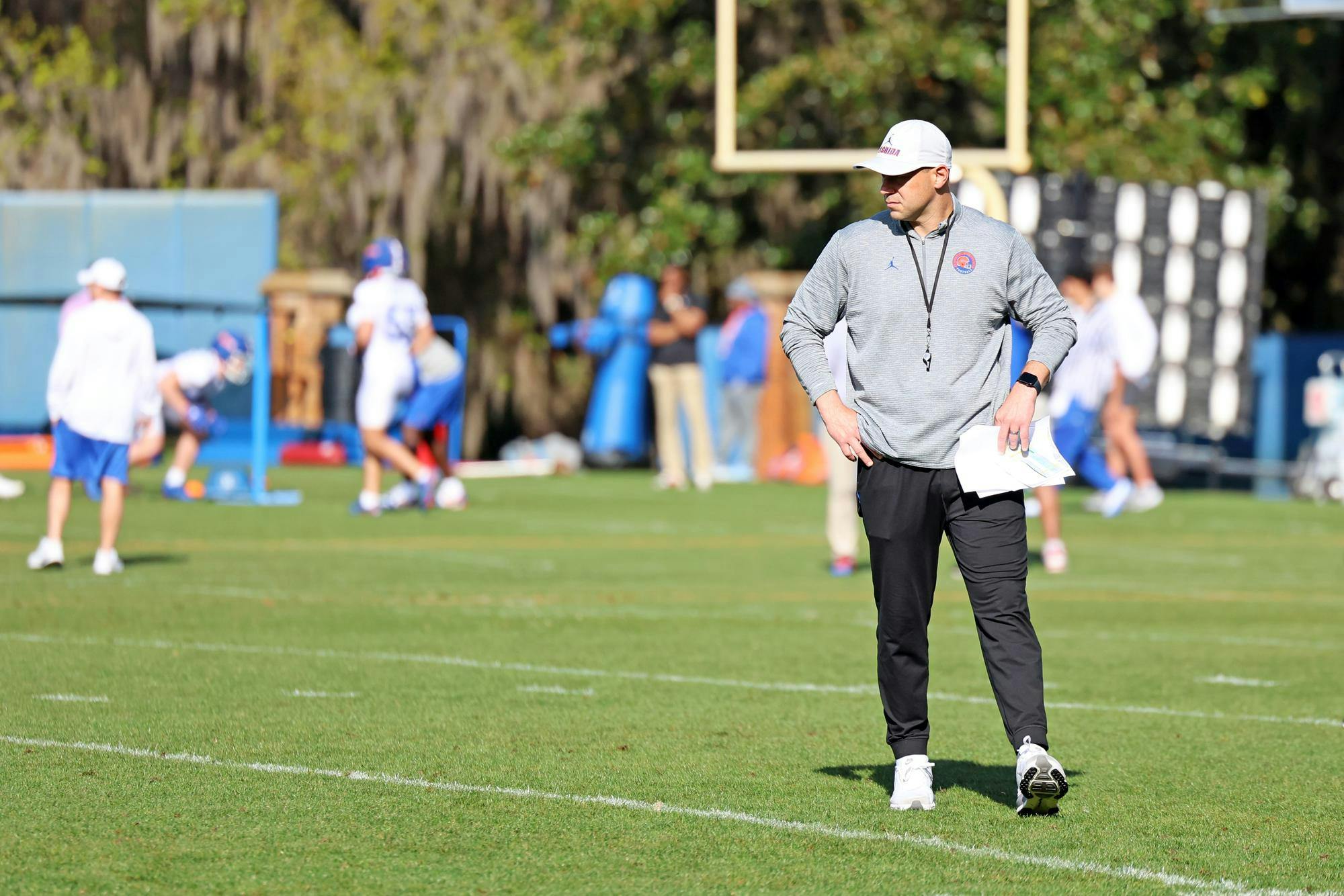 Florida football head coach Jon Sumrall watches the wide receivers during spring camp at the Heavener Football Training Center in Gainesville, Fla., on Tuesday, March 3, 2026.