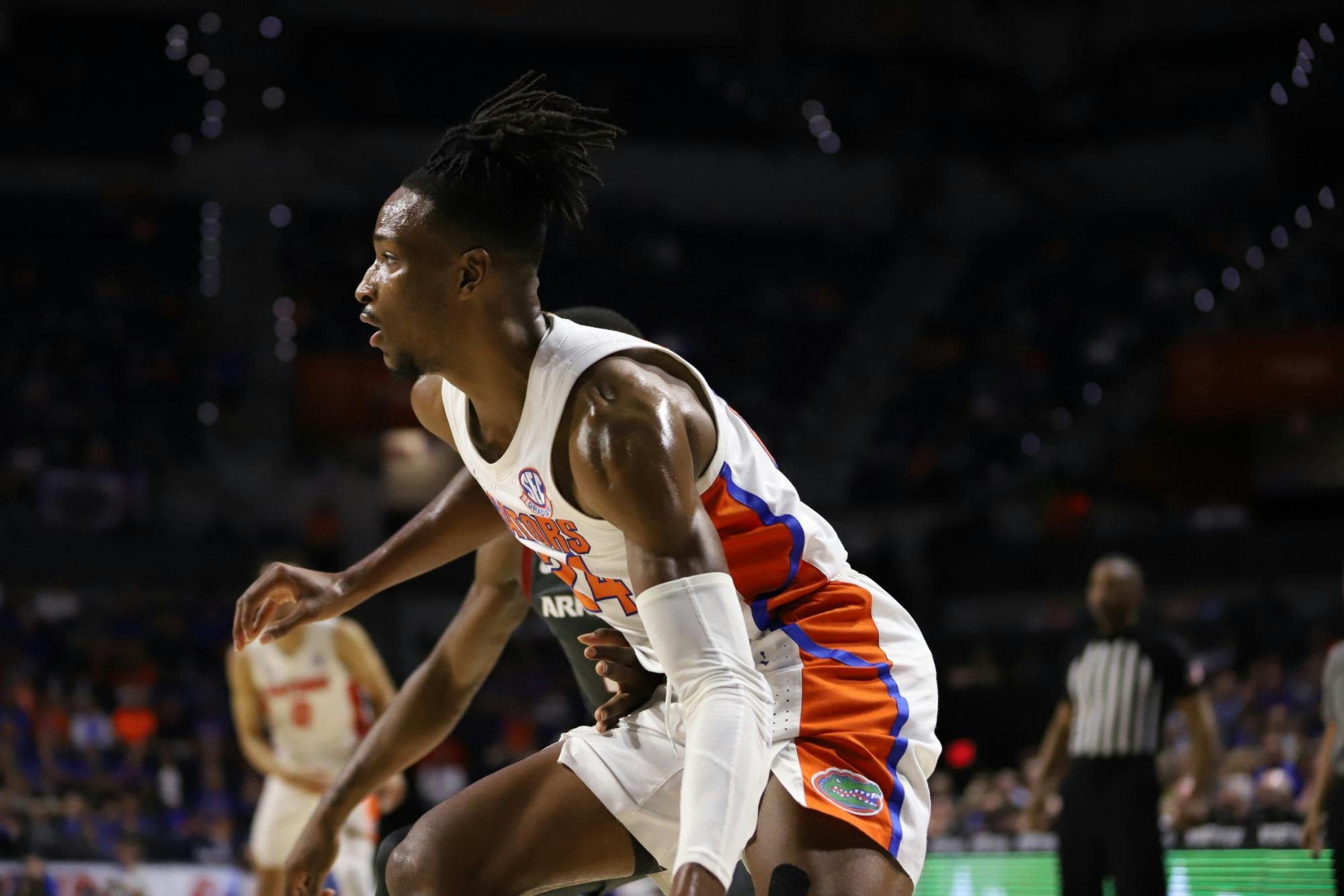 Phlandrous Fleming Jr advances the ball for the Florida Gators against No. 2 Auburn, Feb. 19