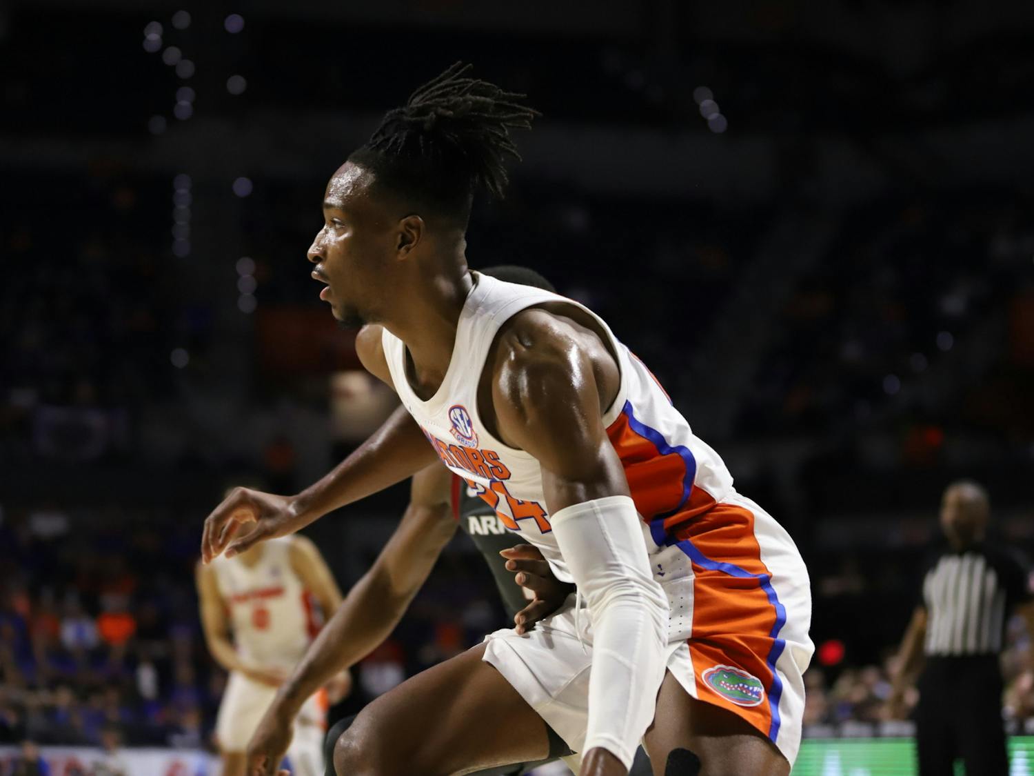 Phlandrous Fleming Jr advances the ball for the Florida Gators against No. 2 Auburn, Feb. 19