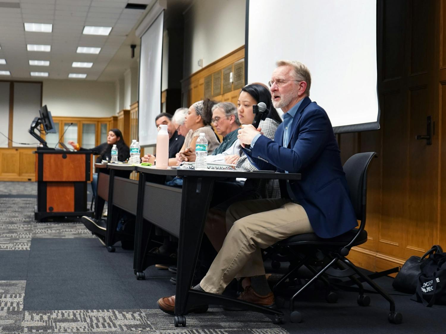 UF historian and task force member Carl Van Ness responds to a question from a student panel at a roundtable discussion on African American and Native American History at Smathers Library Tuesday, Jan. 17, 2023.