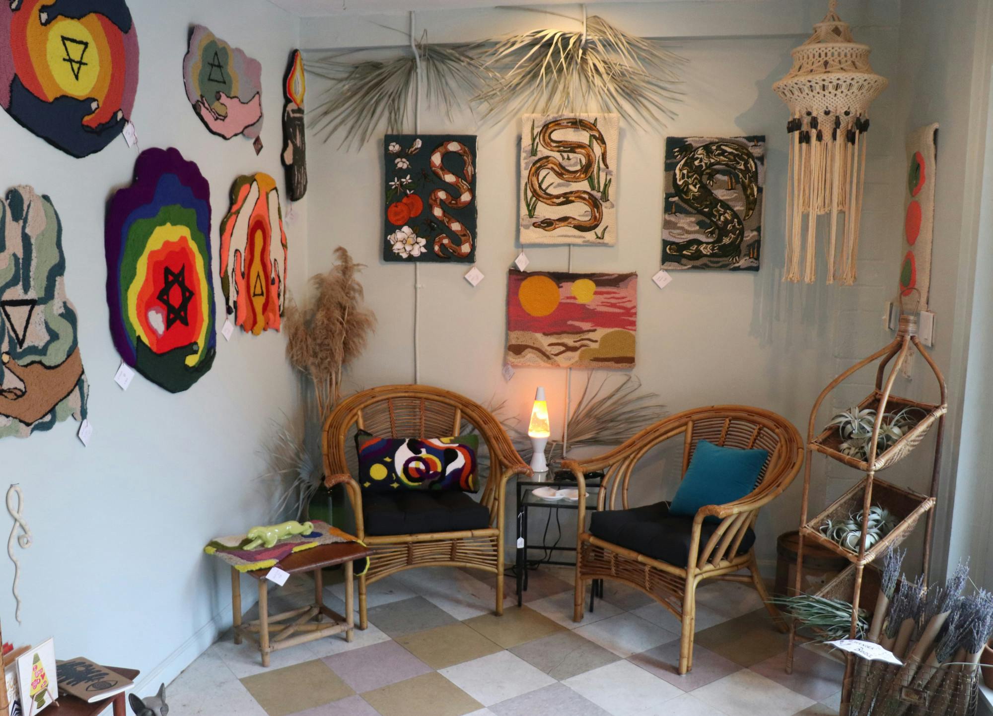 The artwork of Avery Bender, 35, owner of Phantom Fiber Wares, hangs for sale inside Auk Market on Wednesday, Sept. 15, 2021. Each fiber-based work takes anywhere from 15 to 60 hours to create.
