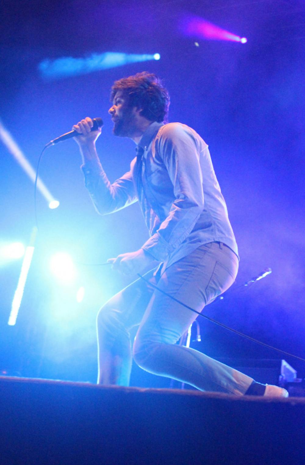 <p>Michael Angelakos, the lead singer for Passion Pit, performs as the last act of the night at Coastline Music Festival.</p>