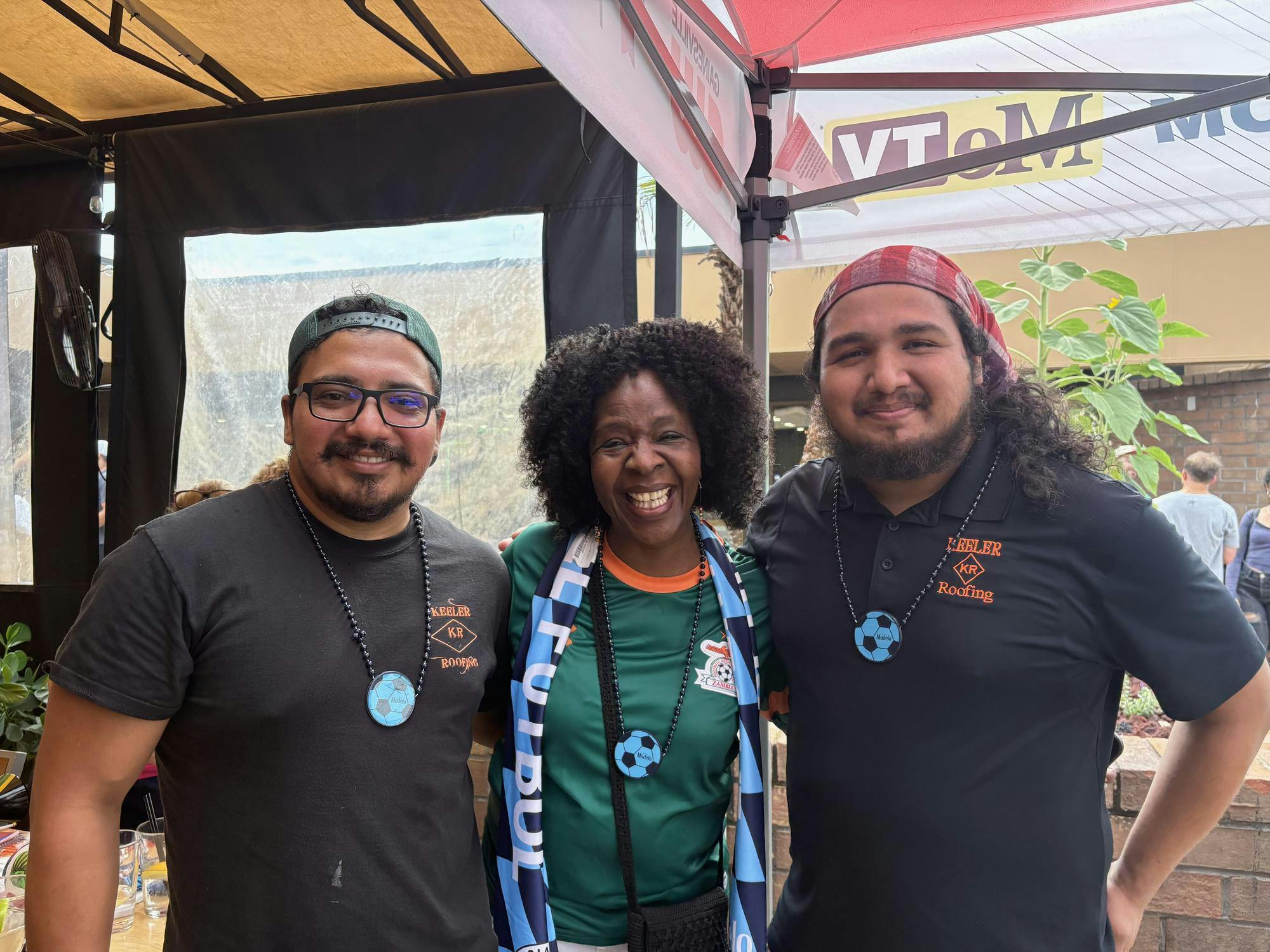 Ricardo Cedillo (left), Agnes Leslie (center) and Salvador Cedillo (right) pose for a photo outside Las Carretas after the first World Cup match between Mexico and South Africa, Thursday, June 11, 2026, in Gainesville, Fla. 