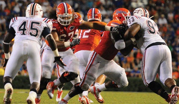 Florida right guard Jon Halapio (67) said the offensive line now trusts each other. He said their off-the-field relationships have helped bring the unit closer together.