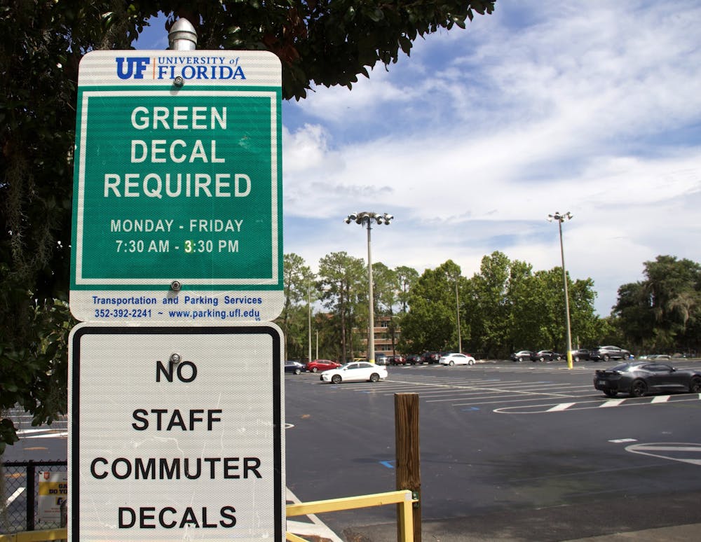The parking lot next to Flavet Field at UF, shown on Thursday, Sept. 2, 2021, was changed to a green decal only location. This change affects the ability of students with Park and Ride decals to park on campus. (Photo by Kiara Cline)