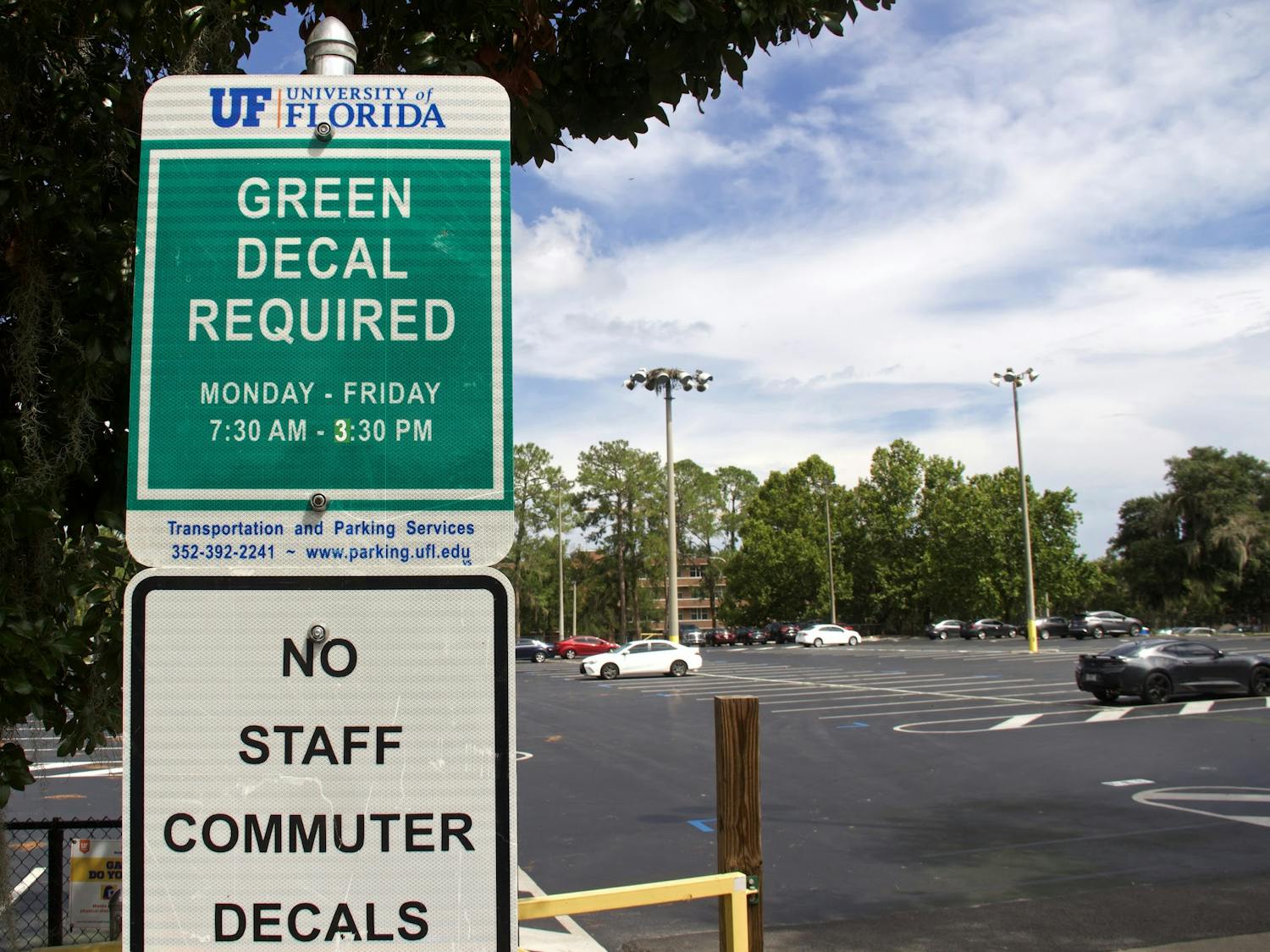 The parking lot next to Flavet Field at UF, shown on Thursday, Sept. 2, 2021, was changed to a green decal only location. This change affects the ability of students with Park and Ride decals to park on campus. (Photo by Kiara Cline)