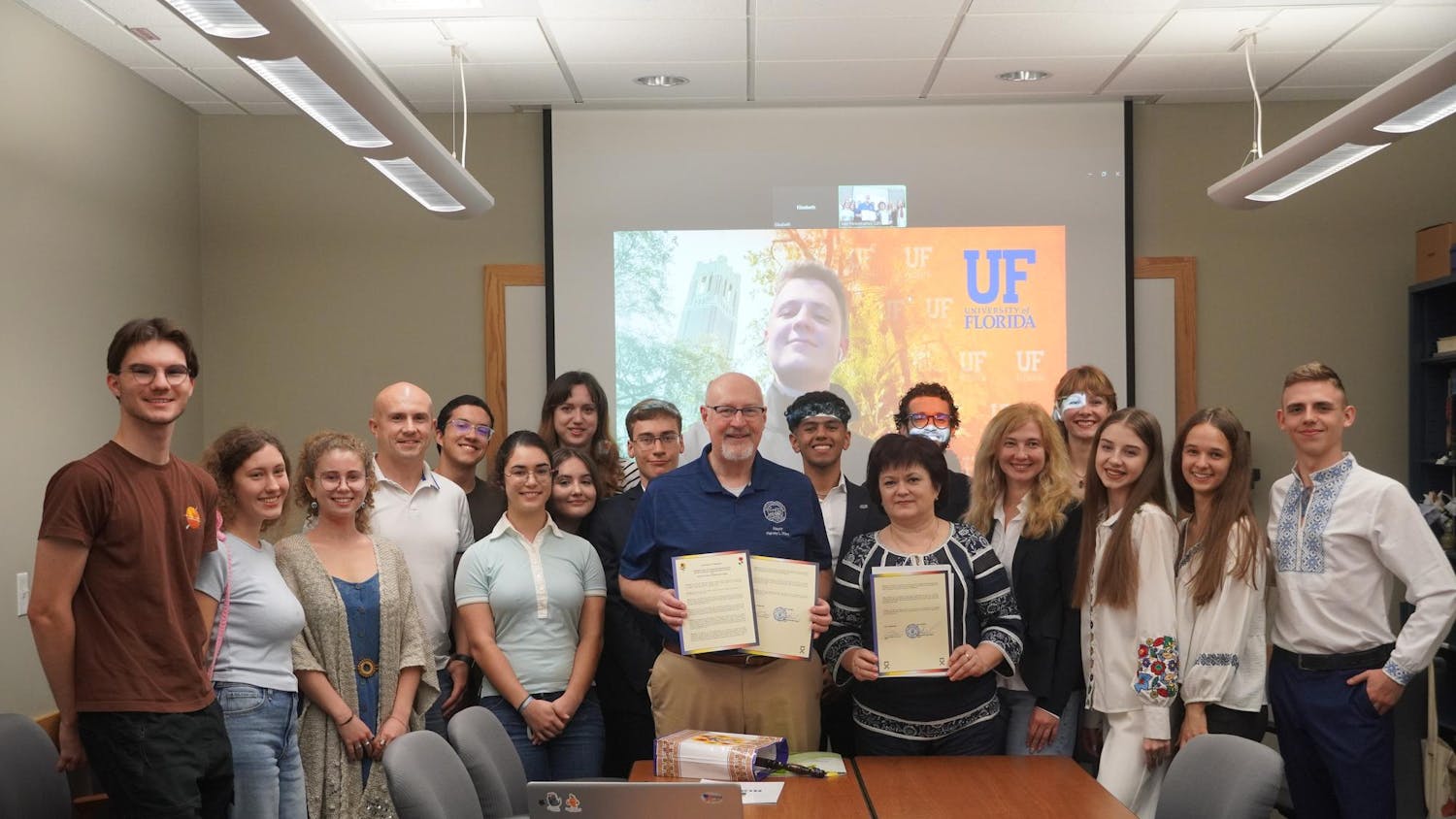 UF Ukraine Rebuilding Initiative members stand with Gainesville mayor to mark sister-city partnership Oct. 31, 2024.