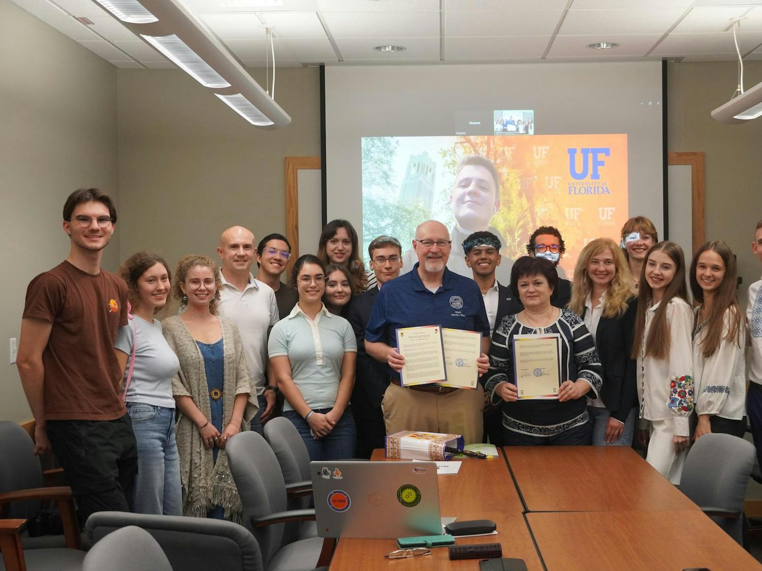 UF Ukraine Rebuilding Initiative members stand with Gainesville mayor to mark sister-city partnership Oct. 31, 2024.