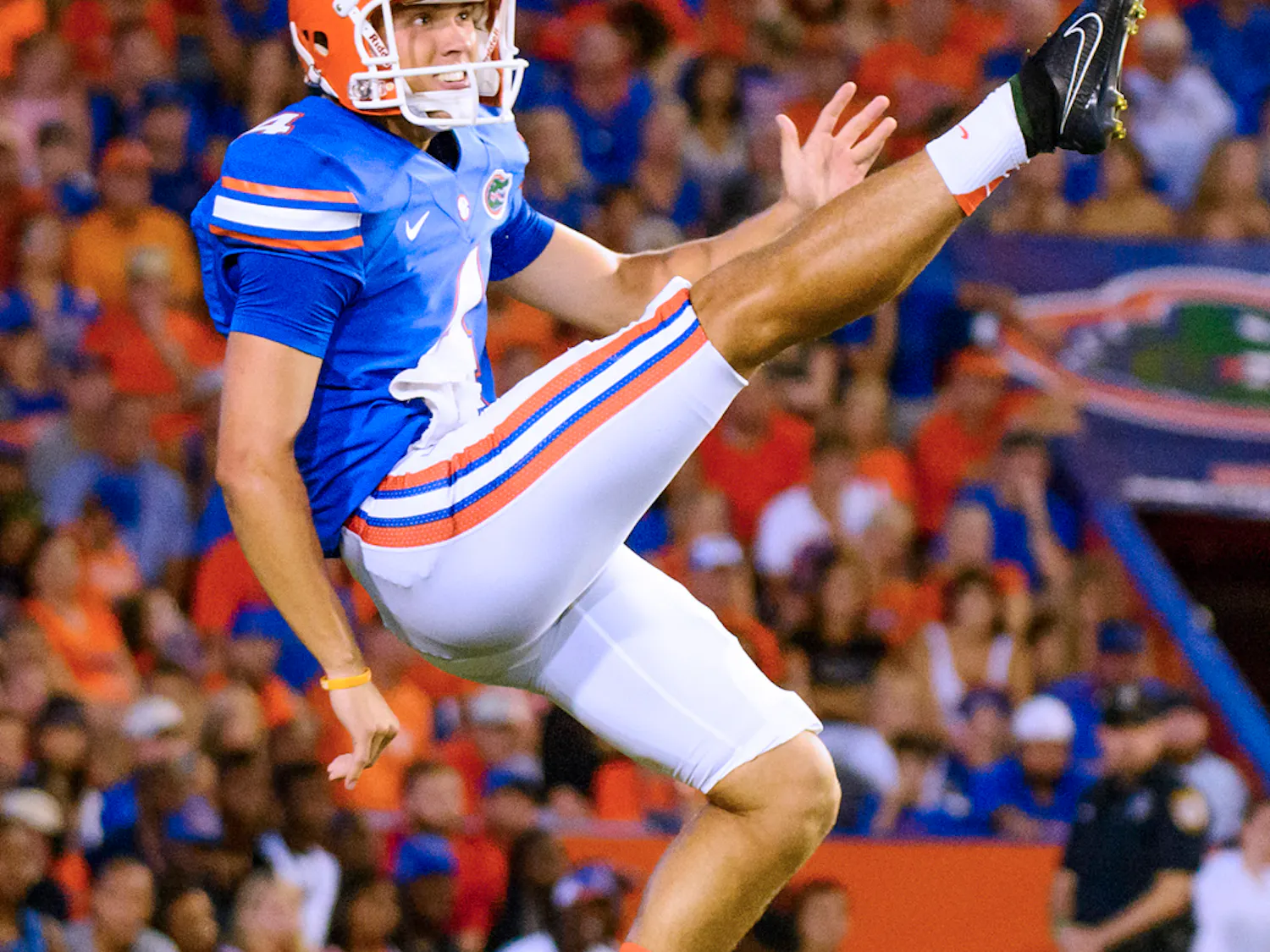 Kyle Christy punts the ball during Florida's 36-30 triple-overtime win against Kentucky on Saturday at Ben Hill Griffin Stadium.