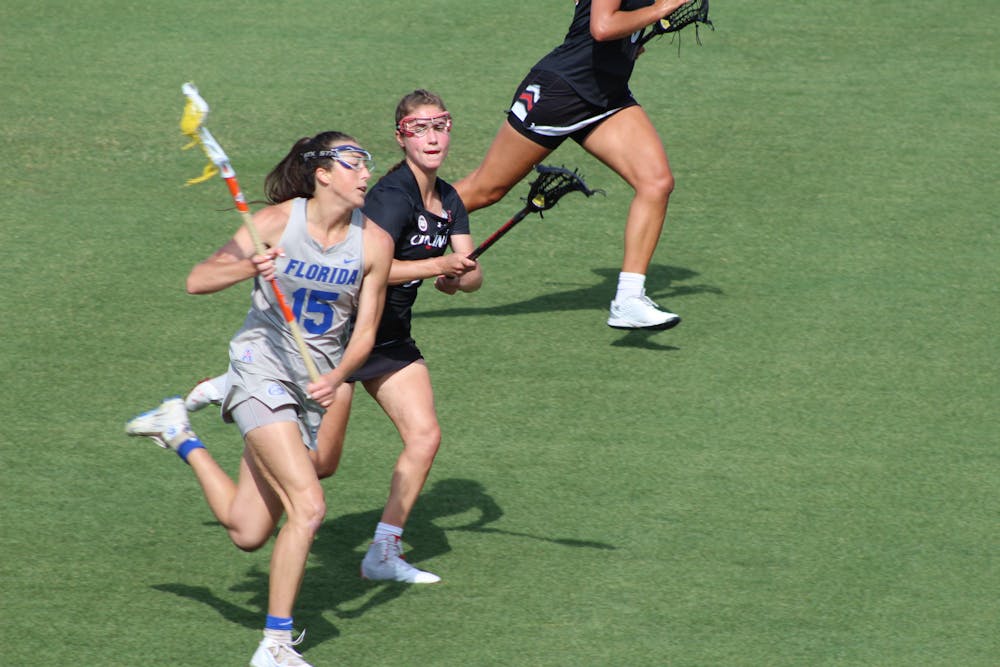 Senior Grace Haus runs down the field in Florida's win over Cincinnati on May 6. The Gators look to take home the AAC Championship Saturday against Temple. 