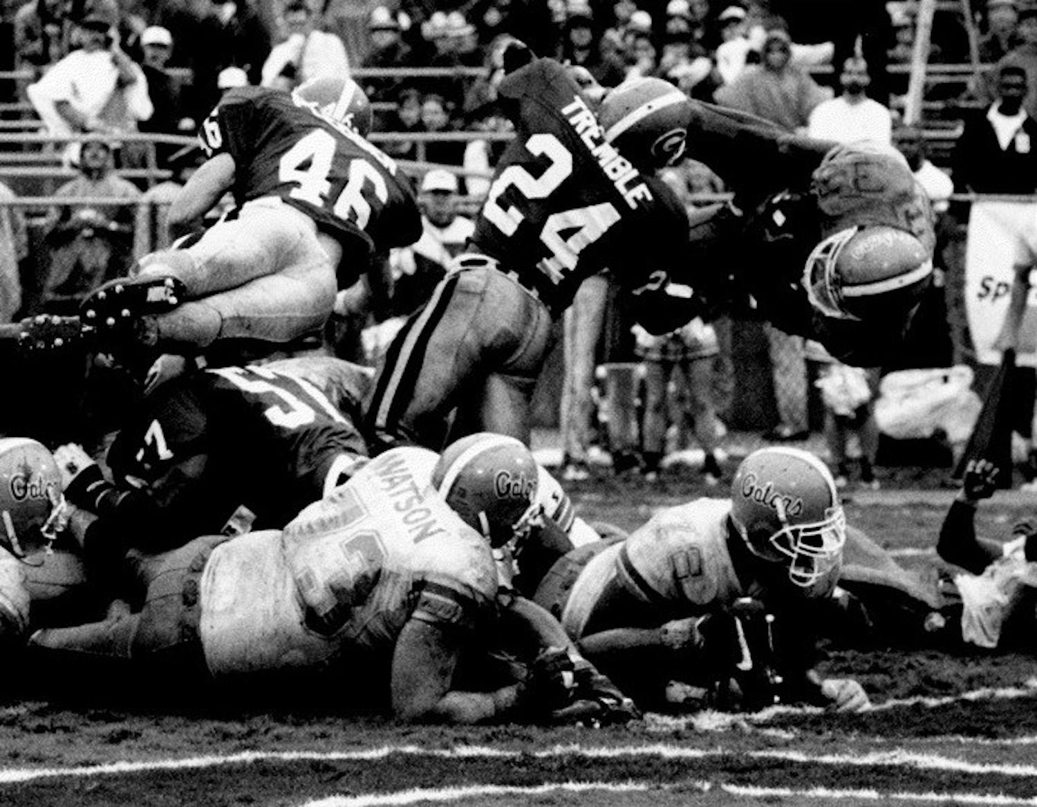 Running back Errict Rhett dives into the end zone in the Gators&#x27; 33-26 win against the Georgia Bulldogs on Saturday, Oct. 30, 1993. 