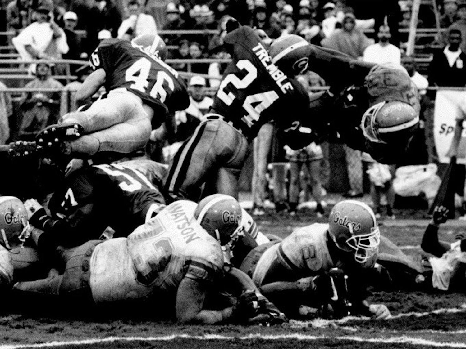 Running back Errict Rhett dives into the end zone in the Gators' 33-26 win against the Georgia Bulldogs on Saturday, Oct. 30, 1993.