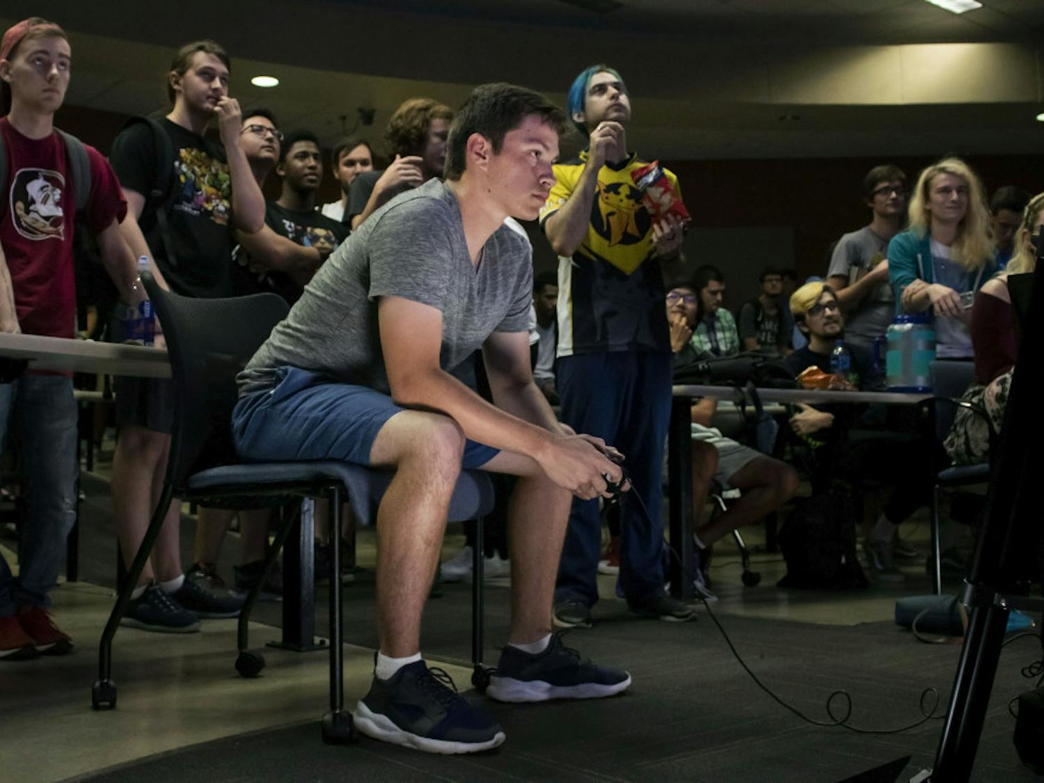 Ryan Erickson, a 19-year-old electrical engineering student, plays Super Smash Bros. Ultimate Friday night during a tournament held in Turlington. Erickson, who goes by the gamertag “Poet,” is one of Gainesville’s top competitive Smash players and is currently ranked as the 4th best player in North Florida. He has competed in local, statewide and nationwide tournaments.