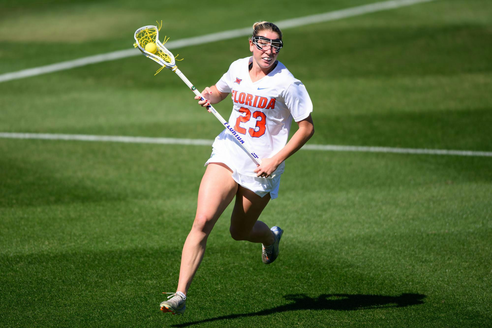 Florida midfielder Riley Zusi (23) runs during the second half of an NCAA lacrosse match against Michigan, Friday, Feb. 13, 2026, in Gainesville, Fla.