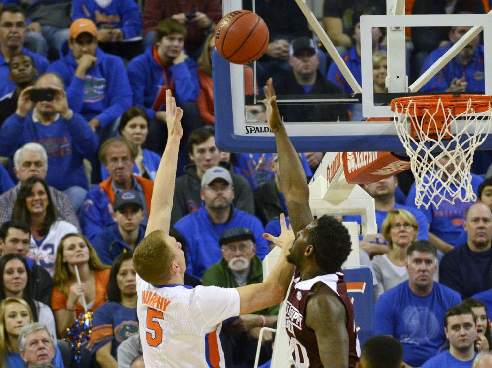<p>Alex Murphy attempts a layup during Florida's win against Mississippi State on Saturday in the O'Connell Center.</p>