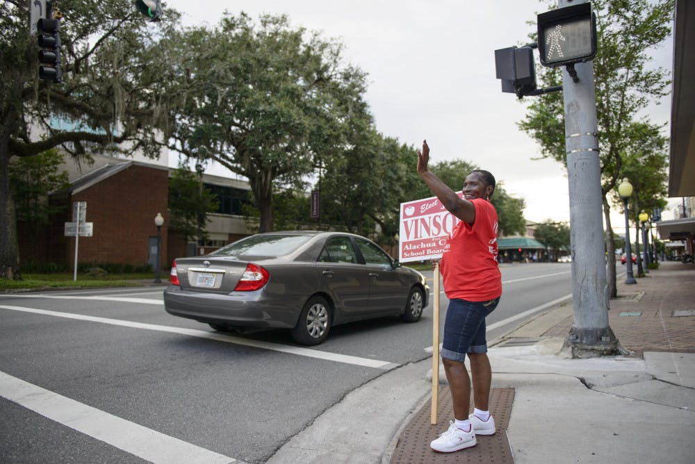 ELECTIONS - Jackie Showers stands outside the Alachua County Supervisor of Elections Office Tuesday evening.