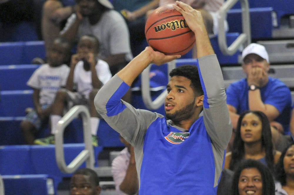 <p>UF guard Brandone Francis-Ramirez shoots during the Gators Madness three-point shooting contest on Oct. 2, 2015, in the O'Connell Center.</p>