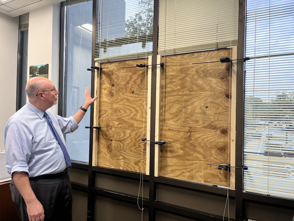 <p>Gainesville Mayor Harvey Ward shows some of the damage done to city hall in a press conference on Wednesday, March 27, 2024.</p>