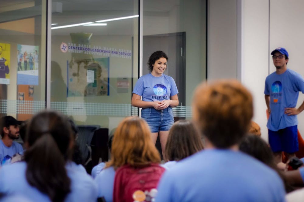 Inspire Party president, Ashley Grabowski, thanks her fellow party members for all the hard work they have put in this past month before the announcement of the student government election results on Wednesday night in Reitz Union. Grabowski, a UF 5th year student double majoring in advertising and english, is already working on bringing Inspire to UF's graduate program.