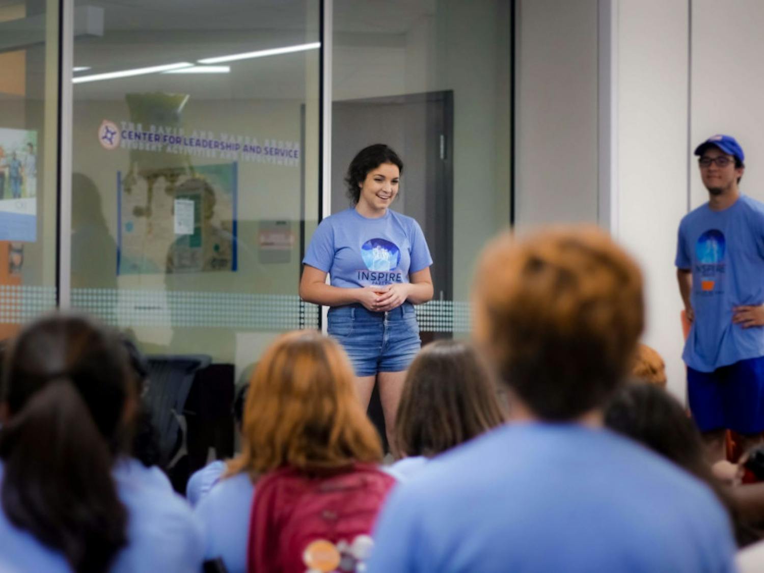 Inspire Party president, Ashley Grabowski, thanks her fellow party members for all the hard work they have put in this past month before the announcement of the student government election results on Wednesday night in Reitz Union. Grabowski, a UF 5th year student double majoring in advertising and english, is already working on bringing Inspire to UF's graduate program.