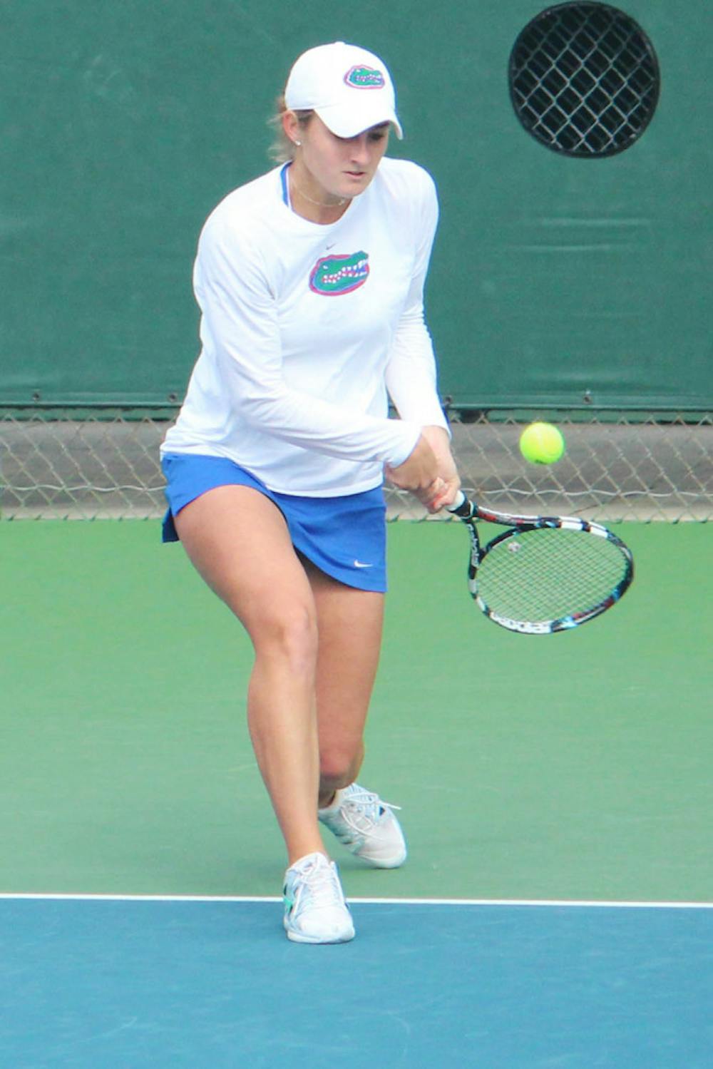 <p>Kourtney Keegan returns a ball during Florida’s 4-0 win against Harvard on Jan. 26 at the Ring Tennis Complex.</p>