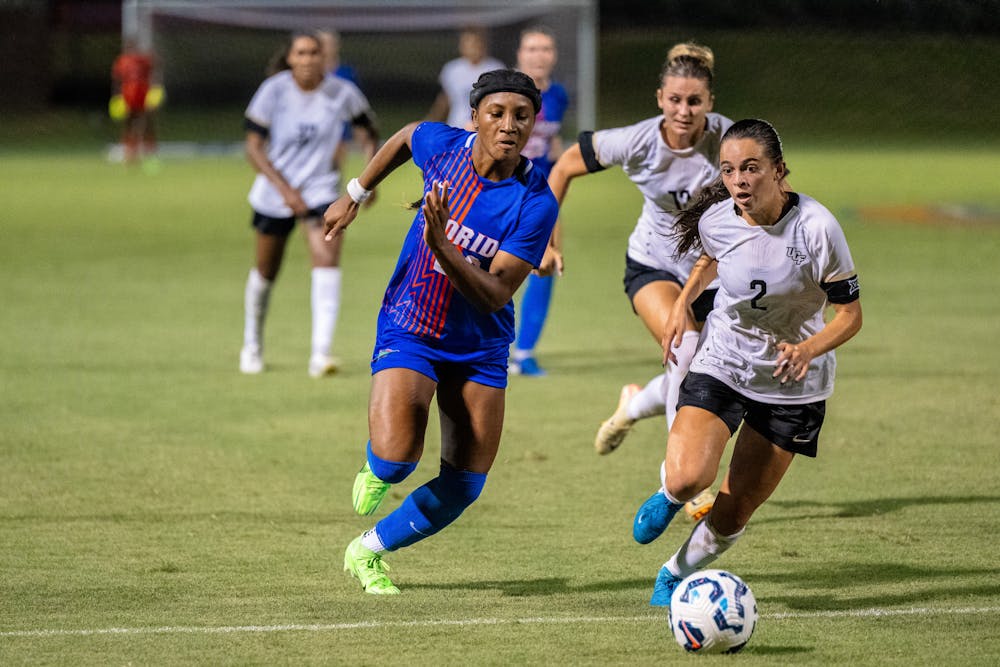 <p>University of Florida soccer player Lena Bailey (29) chases down the ball from University of Central Florida’s Taylor Jacobson (2) in Gainesville, Florida, on Aug. 24, 2024.</p>