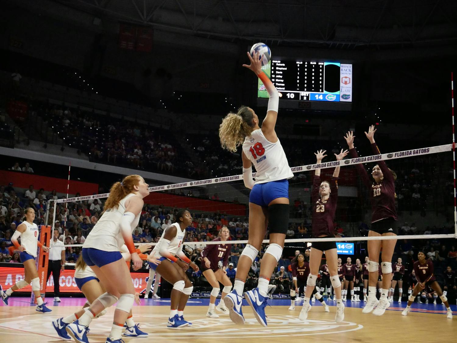 Freshman outside hitter Kennedy Martin spikes the ball in the Gators' 3-0 win against the Winthrop Eagles Saturday, Sept. 9, 2023. 