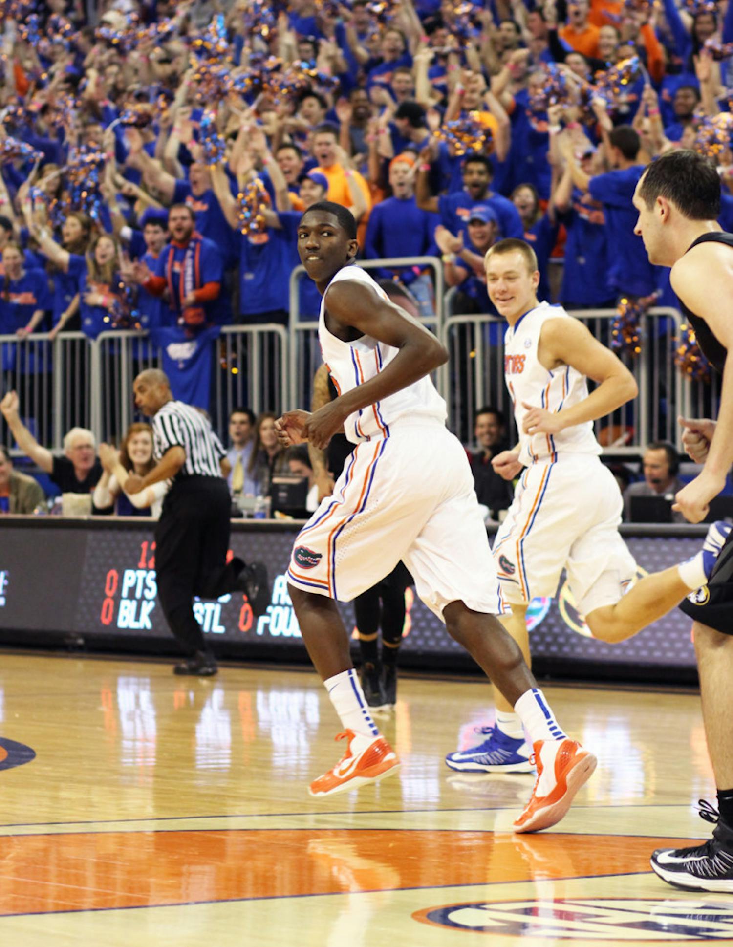 Freshman DeVon Walker runs down the court during Florida’s 83-52 win against Missouri on Jan. 19 in the O’Connell Center. Walker announced Monday he will return to Florida after asking for his release to transfer on May 6. 