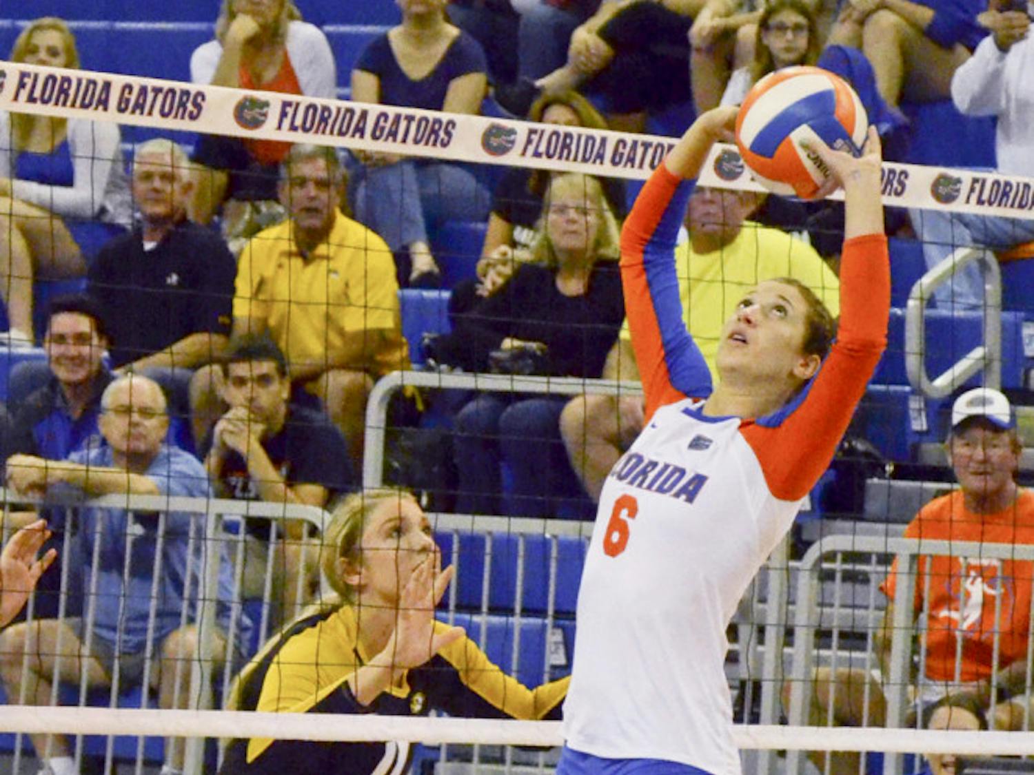 Mackenzie Dagostino sets the ball during Florida's 3-0 win against the Mizzouri on Friday in the O'Connell Center.