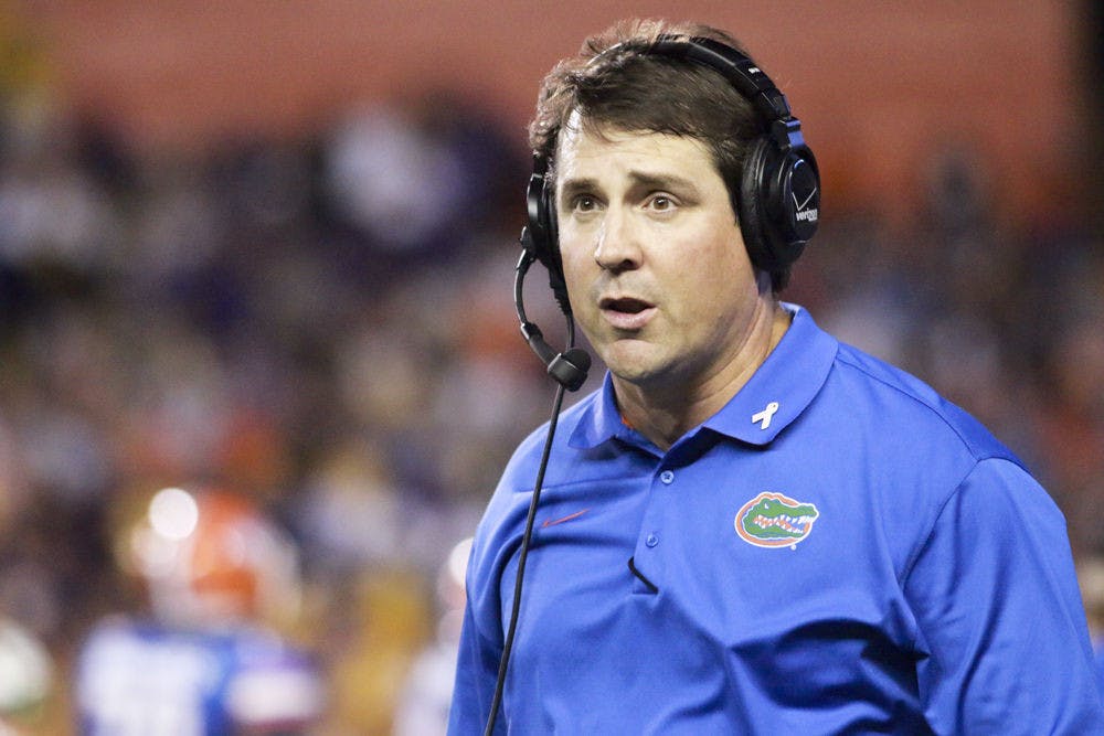 <p>Will Muschamp looks down the field during Florida's 30-27 loss to LSU on Saturday at Ben Hill Griffin Stadium.</p>