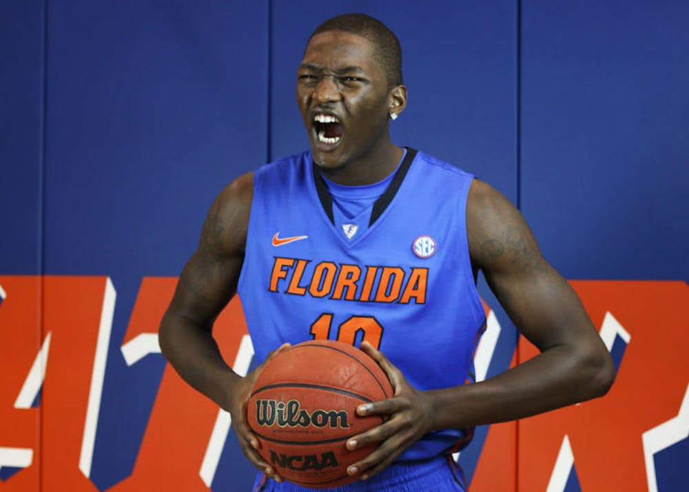 <p>Dorian Finney-Smith poses for a photo during Florida’s basketball media day.&nbsp;</p>
