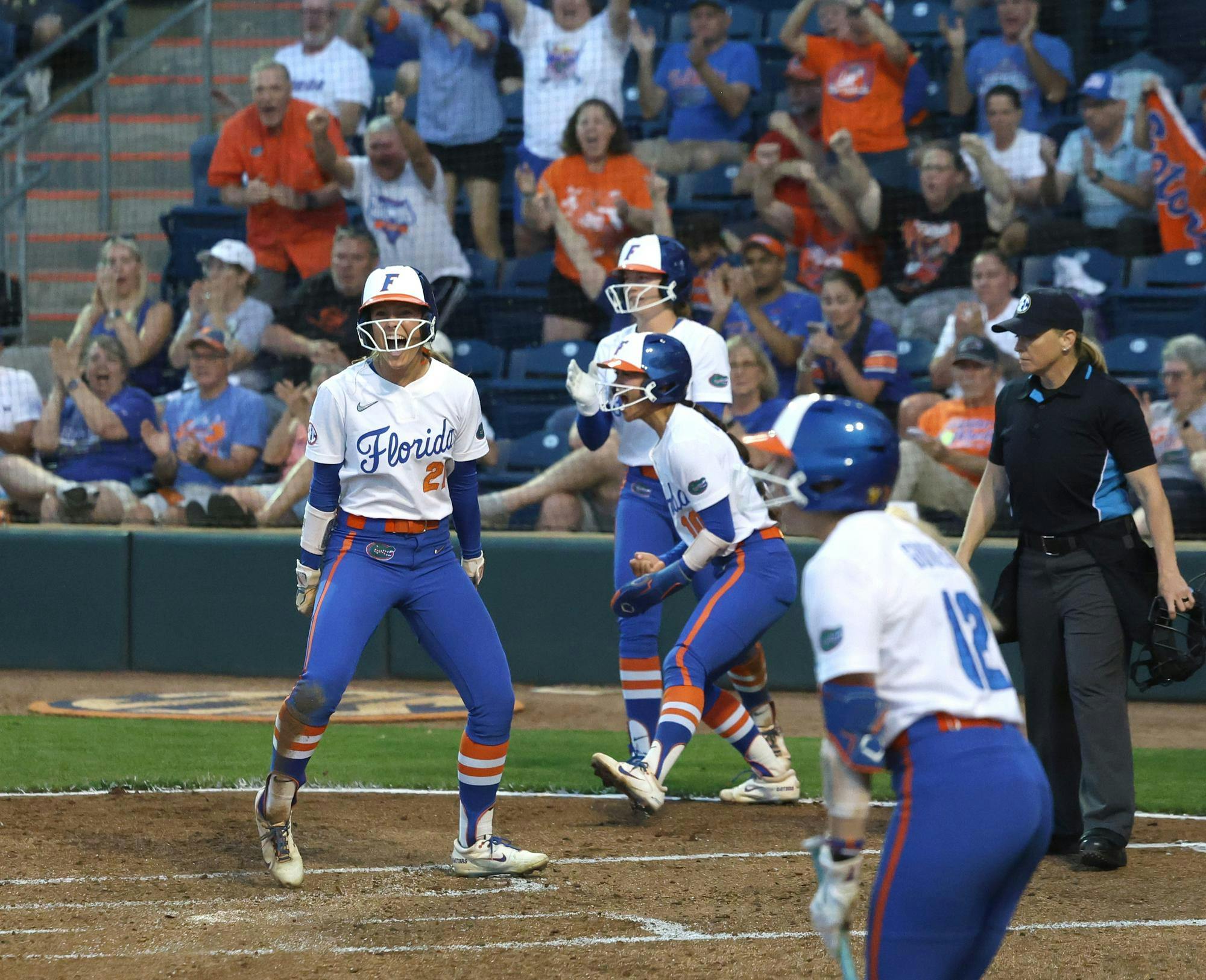 Taylor Schumaker (21) and teammates celebrate scoring during the game against the University of Missouri at Katie Seashole Pressly Stadium in Gainesvile, Fla., on Monday, March 9, 2026.  