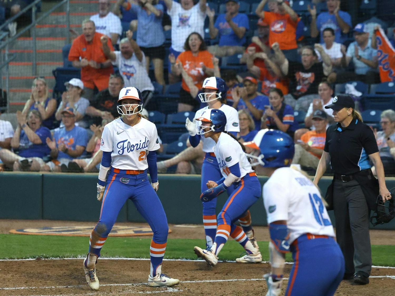 Taylor Schumaker (21) and teammates celebrate scoring during the game against the University of Missouri at Katie Seashole Pressly Stadium in Gainesvile, Fla., on Monday, March 9, 2026.