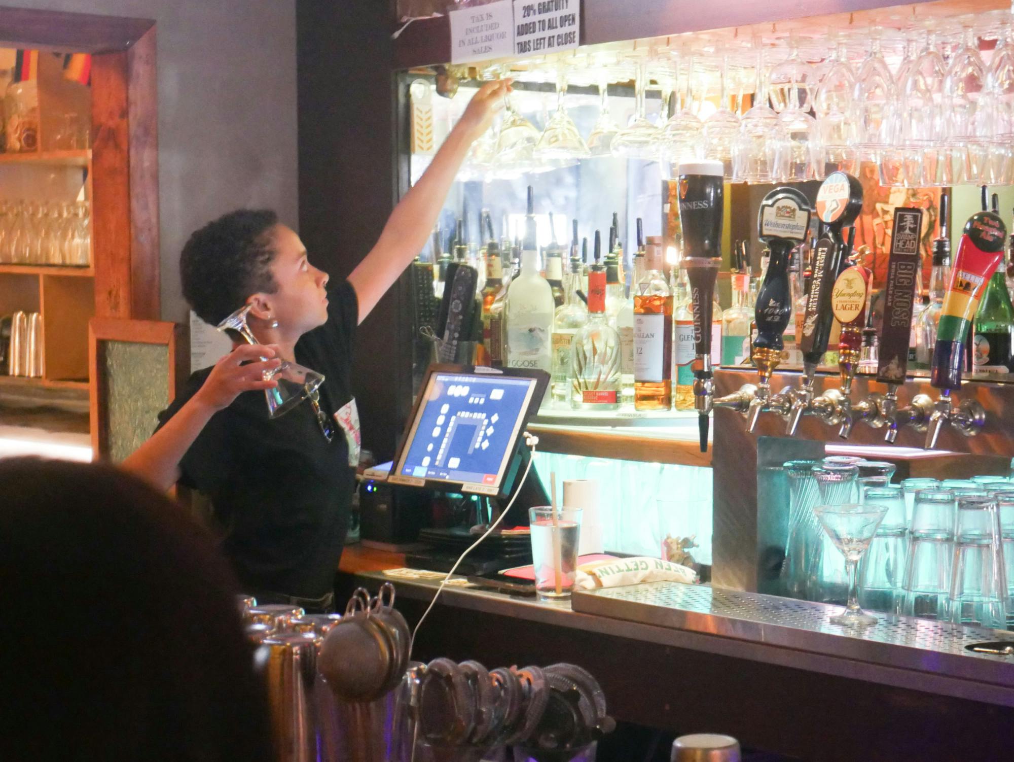 Gabby Lafond tends the bar at The Top on Saturday, July 13, 2024.