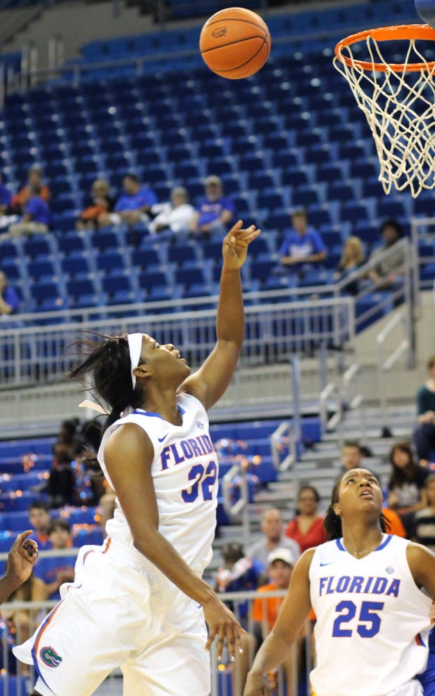 Forward Jennifer George attempts a shot in Florida’s 84-65 win against Georgia State on Nov. 11 in the O’Connell Center. In order to improve three-point shooting, coach Amanda Butler wants the Gators to establish the paint more with post players such as George.
