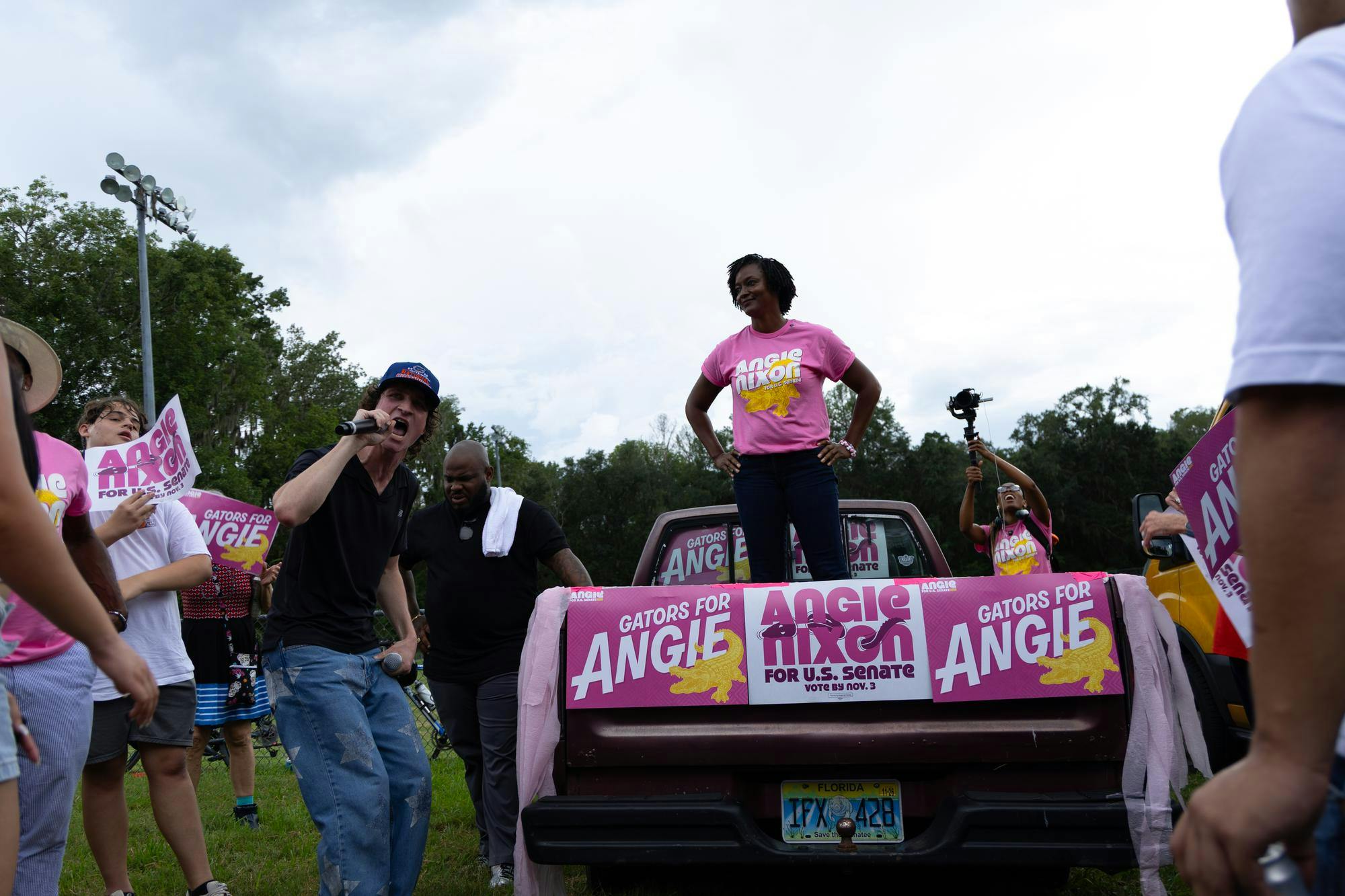 Zander Moricz, a political activist and an executive in the SEE Alliance, shouts as he introduces Angie Nixon before her speech to a crowd near Museum Road, Saturday Sept. 5, 2026, in Gainesville, Fla.