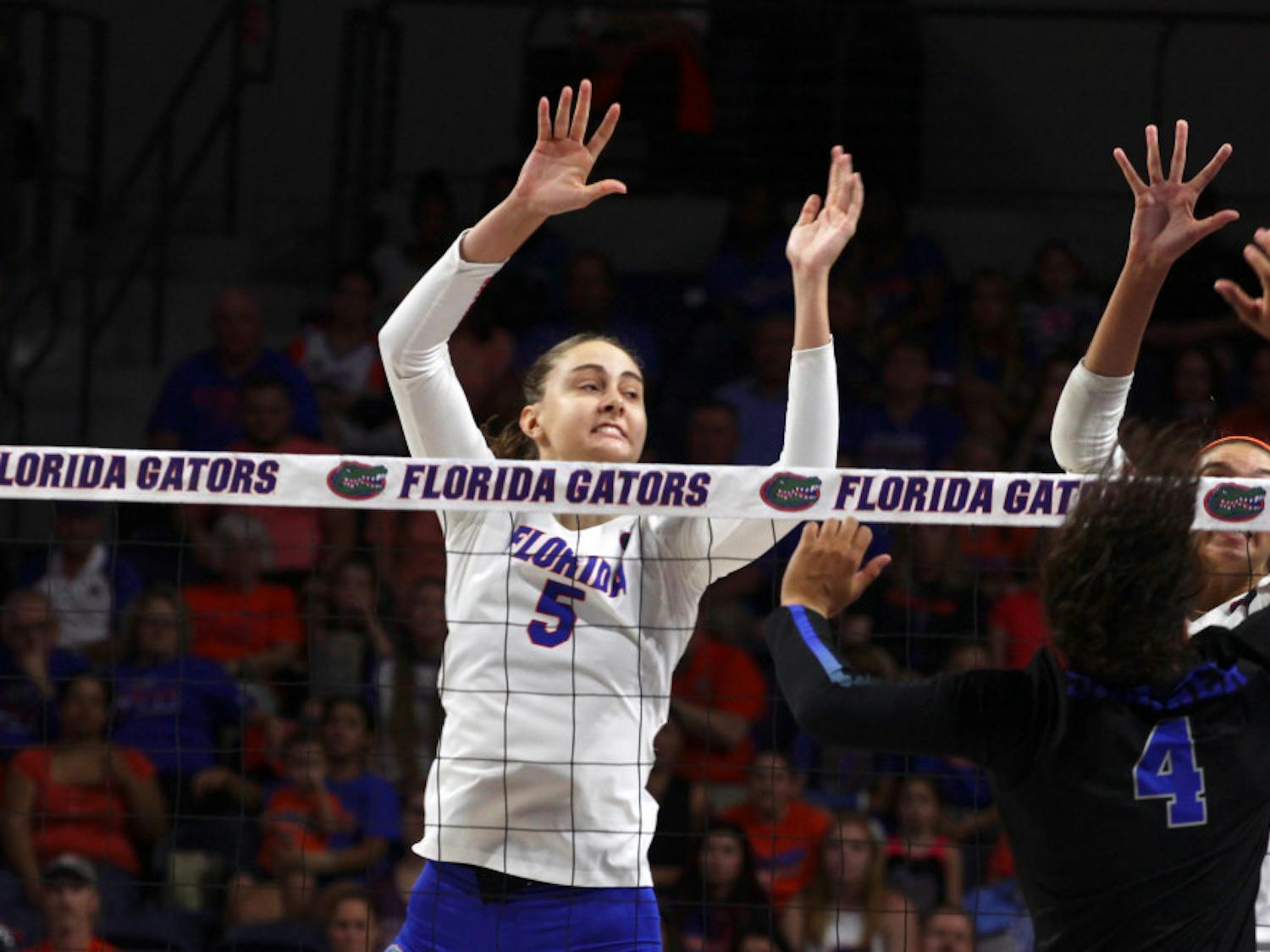 Rachael Kramer goes up for a block during Florida's 3-1 loss to Kentucky on Oct. 15, 2017, at the O'Connell Center. Kramer recorded 11 kills in a win against Mississippi State on Sunday.
