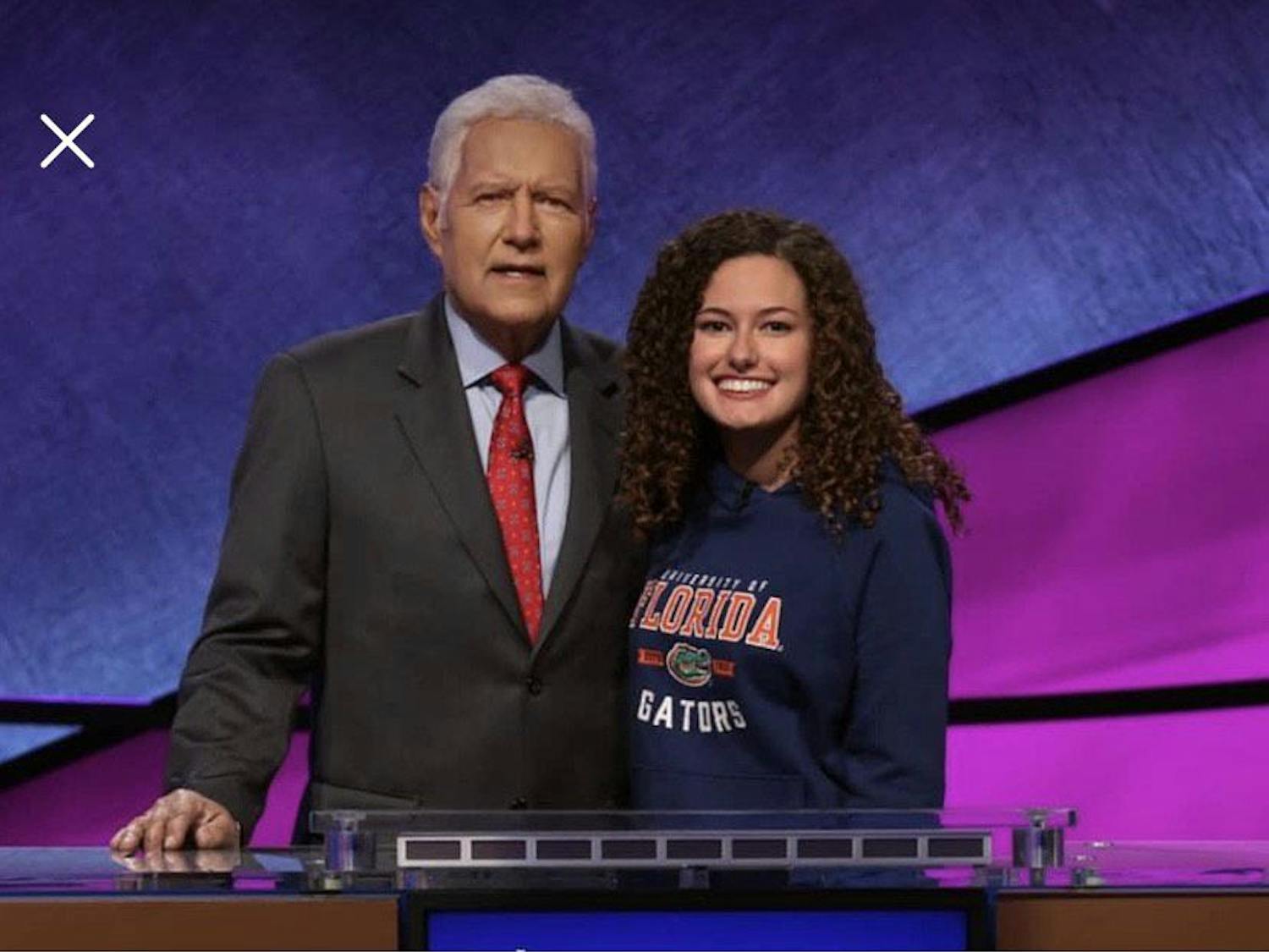 The University of Florida Honors Program posts a photo on Facebook Monday of Jeopardy! host Alex Trebek and Kayla Kalhor, a 19-year-old UF chemistry sophomore who competed in the show's College Championship.&nbsp;