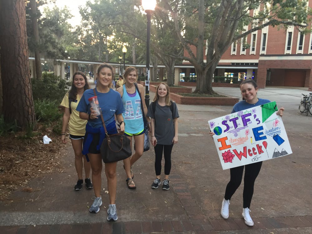 <p><span id="docs-internal-guid-0de6fb8b-ba89-6382-ea2e-dde0beac9941"><span>Members of She’s The First club finish their mile-long walk toward Matherly Hall. The walk was held to raise awareness about women’s education around the world.</span></span></p>
