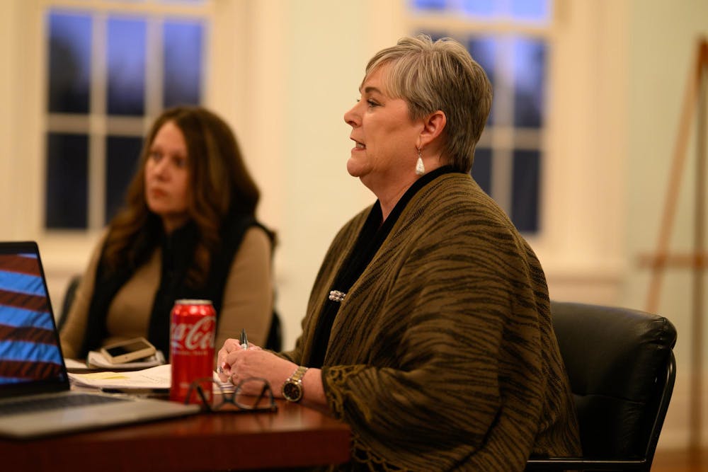 Principal Lacy Roberts speaks during a Newberry Charter School board meeting, Monday, Feb. 23, 2026, at The Little Red Schoolhouse in Newberry, Fla.