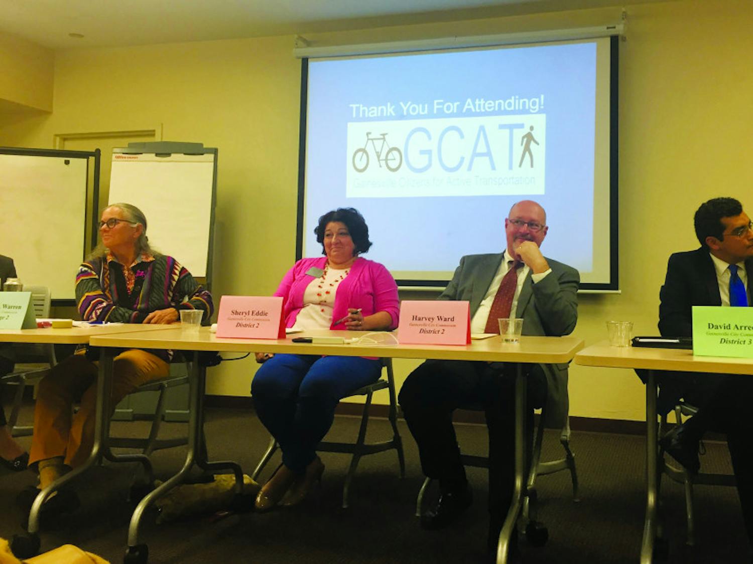 At the third annual candidate forum on Monday, Alachua County City Commission candidates Sheryl Eddie, Helen Warren and Harvey Ward address Gainesville citizens about transportation in Gainesville.