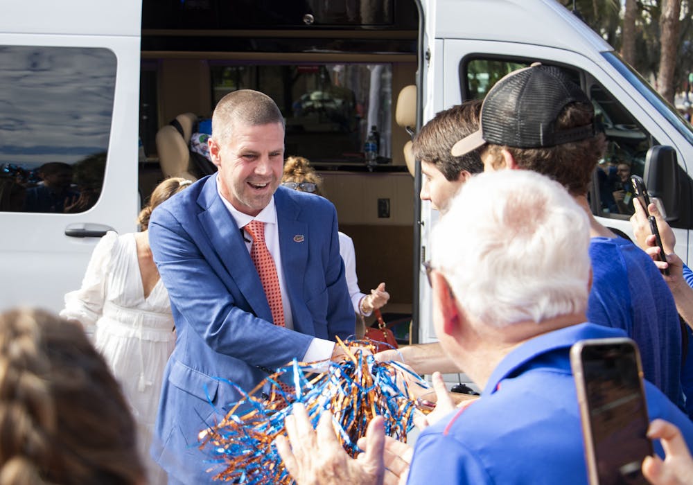<p>Florida football coach Billy Napier greets fans during his first day on the job Dec. 5, 2021 in Gainesville.</p>