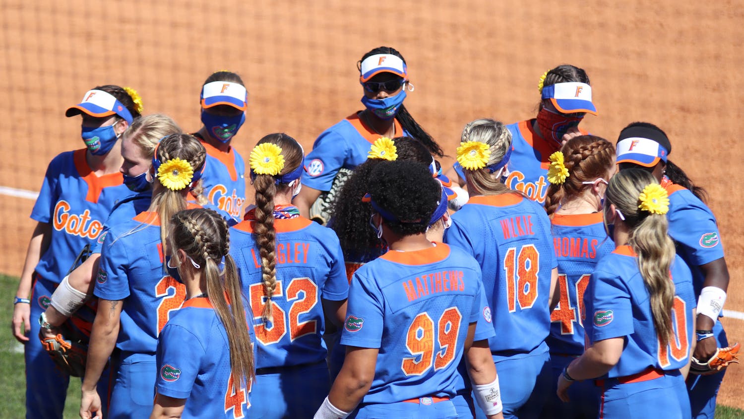 The Florida softball team huddles on February 27 in a game against Louisville. The Gators' season ended Saturday with a second straight Super Regional loss to Georgia.